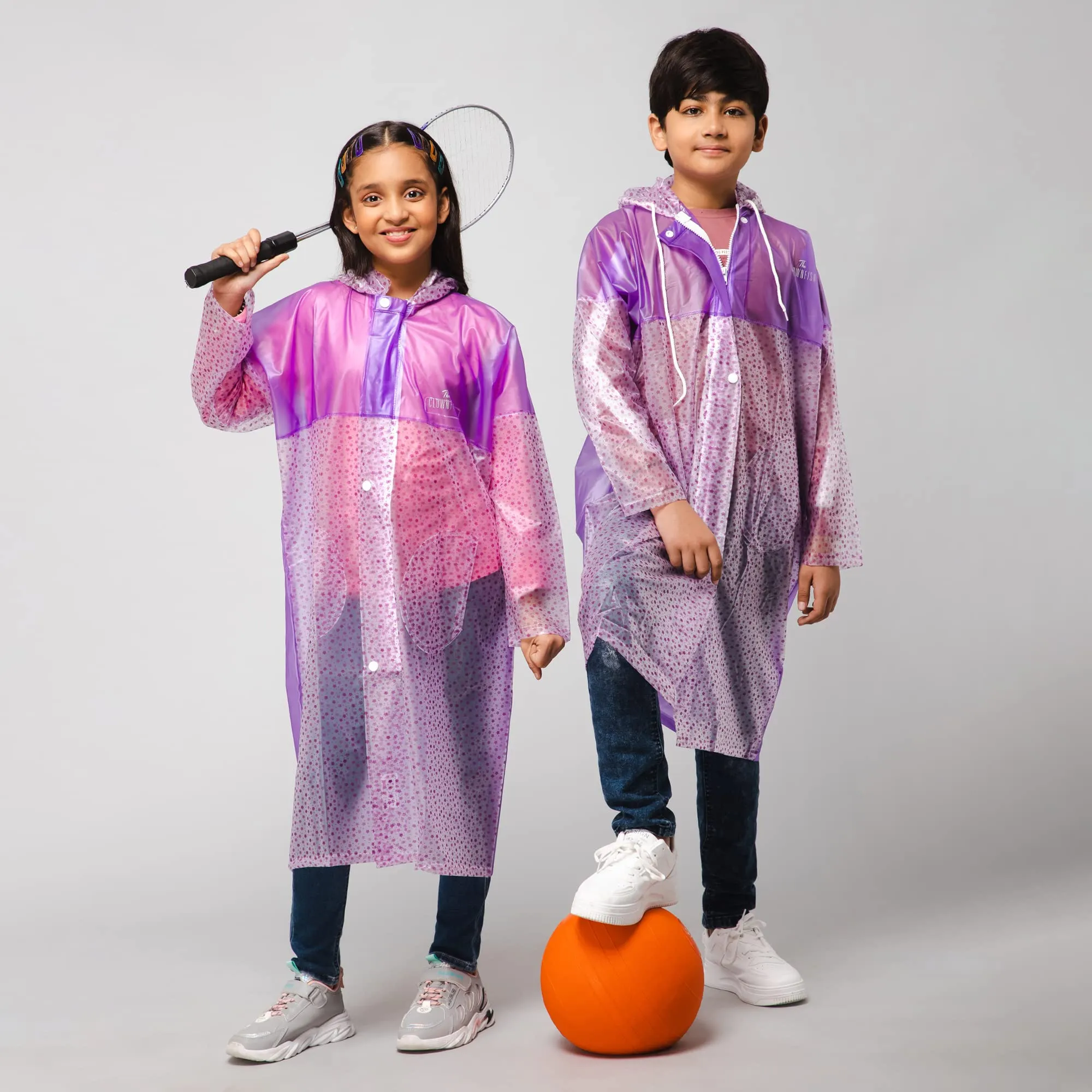 THE CLOWNFISH Wet & Wild Series Unisex Kids Waterproof Single Layer PVC Longcoat/Raincoat with Adjustable Hood. Age-6-7 Years (Light Orange)